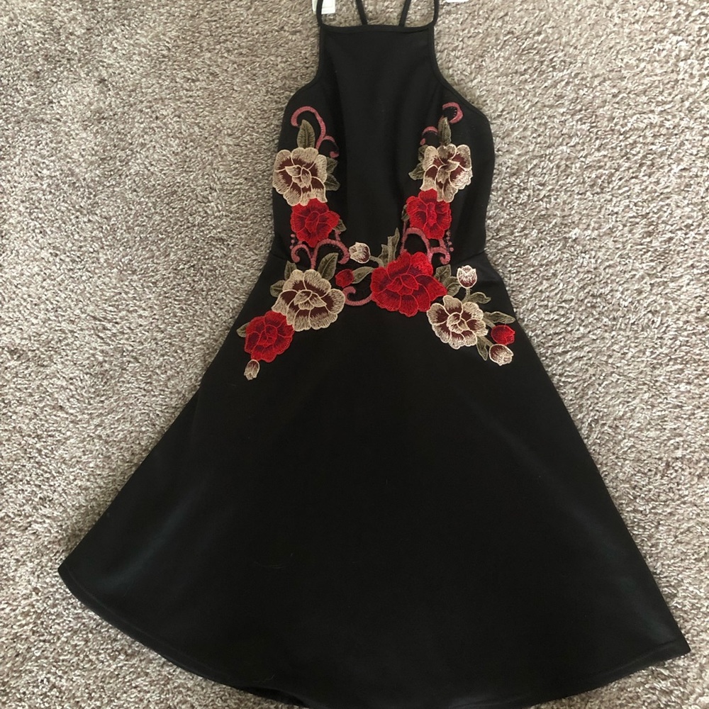 Black dress with embroidered flowers